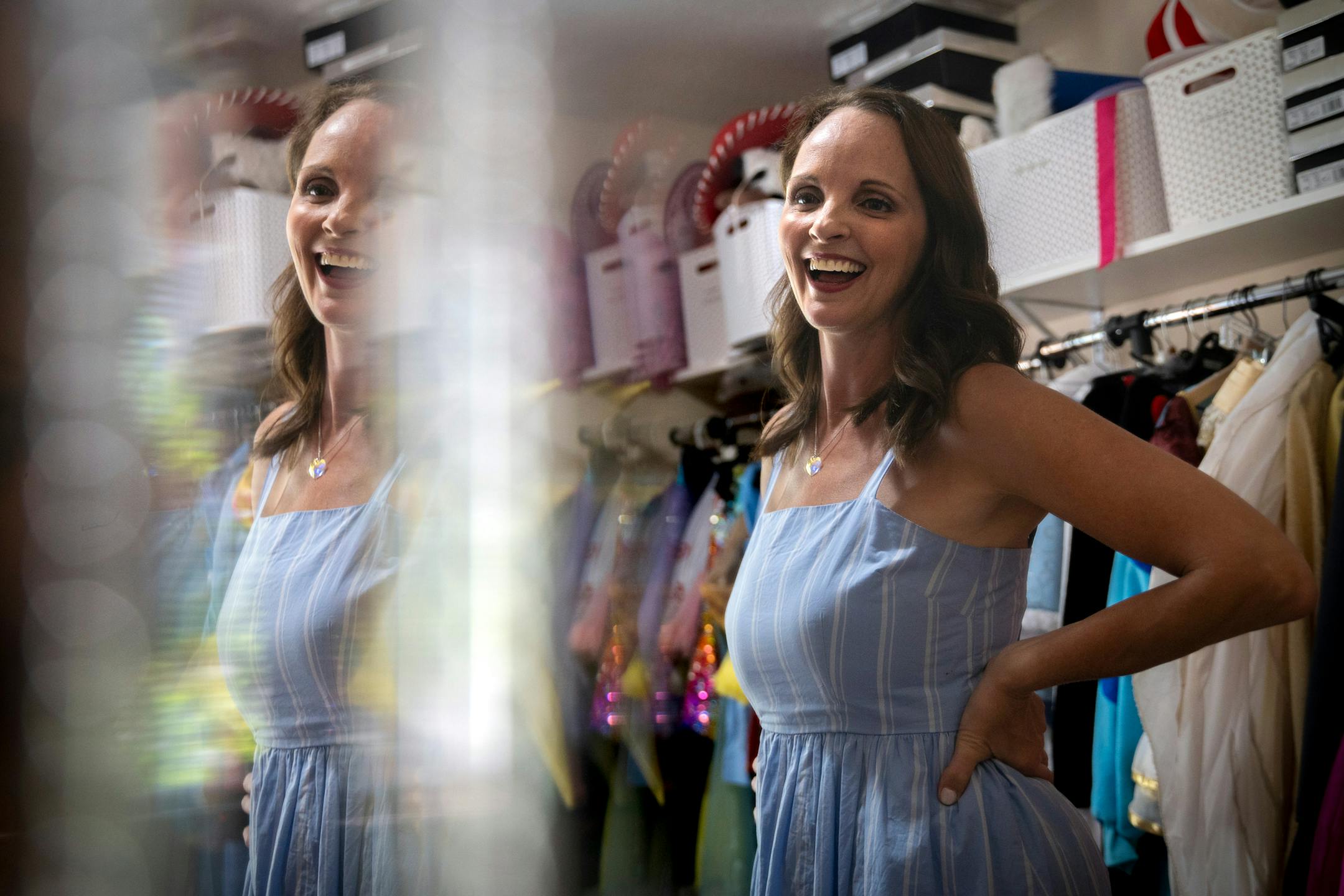 Nicole Fenstad shows off her closet full of costumes at her home in Plymouth, Minn. on Wednesday, July 26, 2023. With her background in theatre, Fenstad built Princess Party Pals and performs in character for a range of events, from preschools to 90-year-old birthday parties. ] Angelina Katsanis • angelina.katsanis@startribune.com