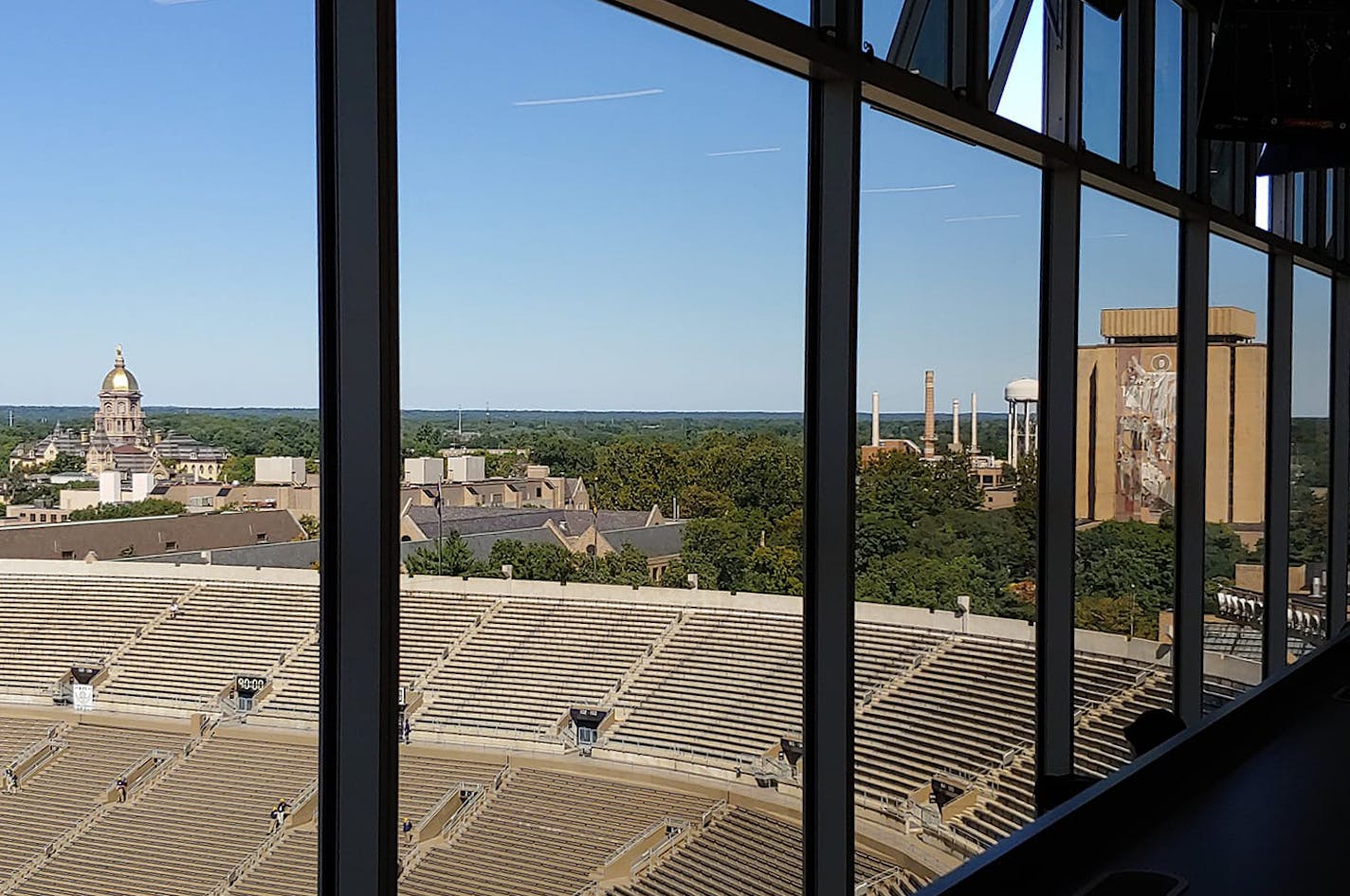 A view from the pressbox at Notre Dame Stadium in South Bend, Ind., on Saturday, Sept. 19, 2020, when the Irish played South Florida. Seen are Notre Dame's iconic Golden Dome and Touchdown Jesus. But the seats were devoid of fans. (CHIP SCOGGINS/Star Tribune) ORG XMIT: dSGas0fR3dwuqGXVIPYt