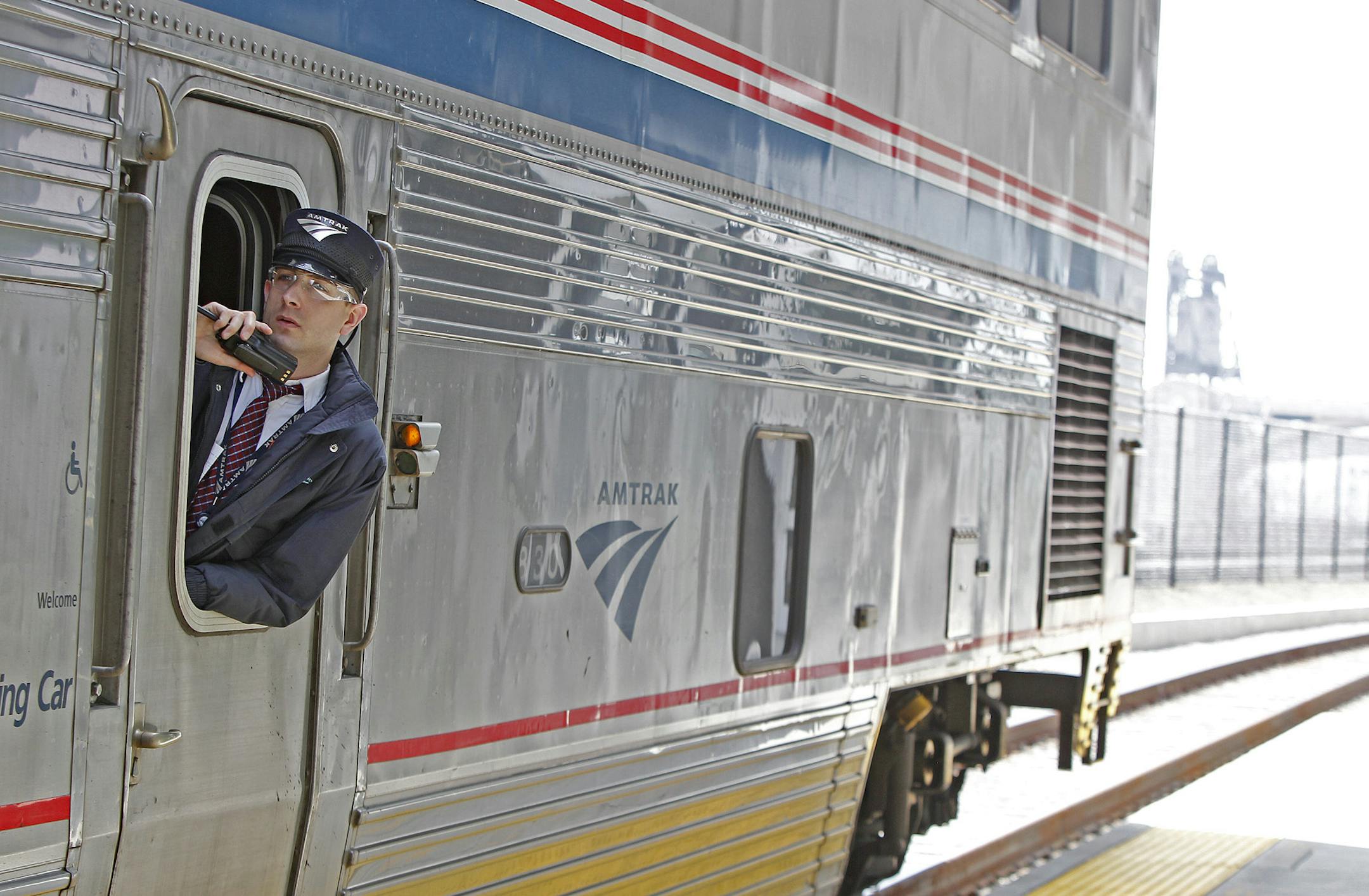 A conductor announced the departure of an Amtrak at the Union Depot, Thursday, May 8, 2014 in St. Paul, MN. It is the first passenger train in more than 40 years to stop at the refurbished Union Depot. ] (ELIZABETH FLORES/STAR TRIBUNE) ELIZABETH FLORES • eflores@startribune.com