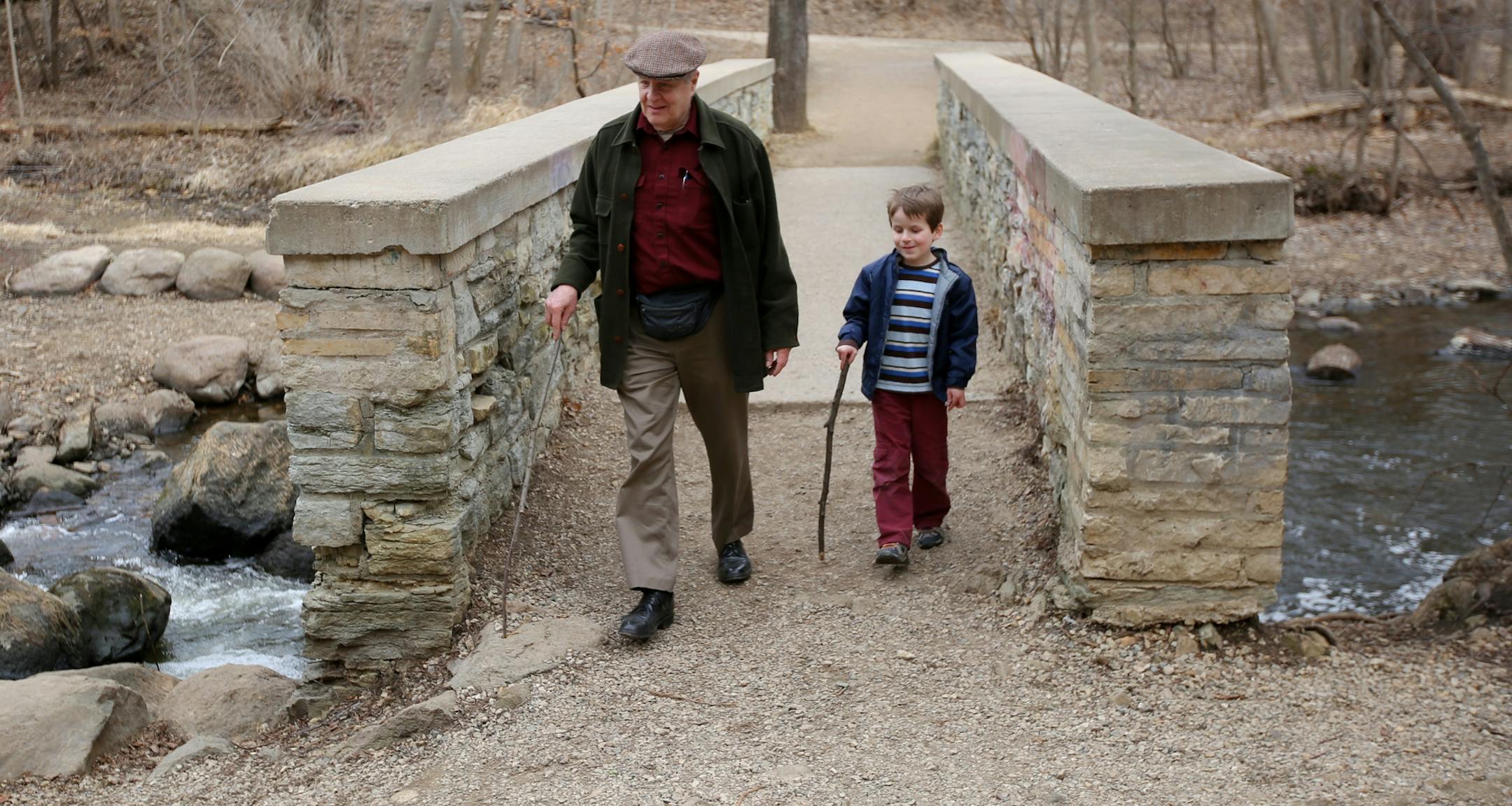 Bill Bertrand and his grandson Augie Bertrand took a walk through Minnehaha Falls park in Minneapolis, Minn., on Monday, March 16, 2015. Bill remembers they took a similar walk this time last year and they had to turn around due to the flooding. ] RENEE JONES SCHNEIDER ï reneejones@startribune.com