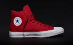 This photo provided by Converse shows the new Fall 2015 Chuck Taylor All Star II red high top sneaker, a modern adaptation of the original Chuck Taylo