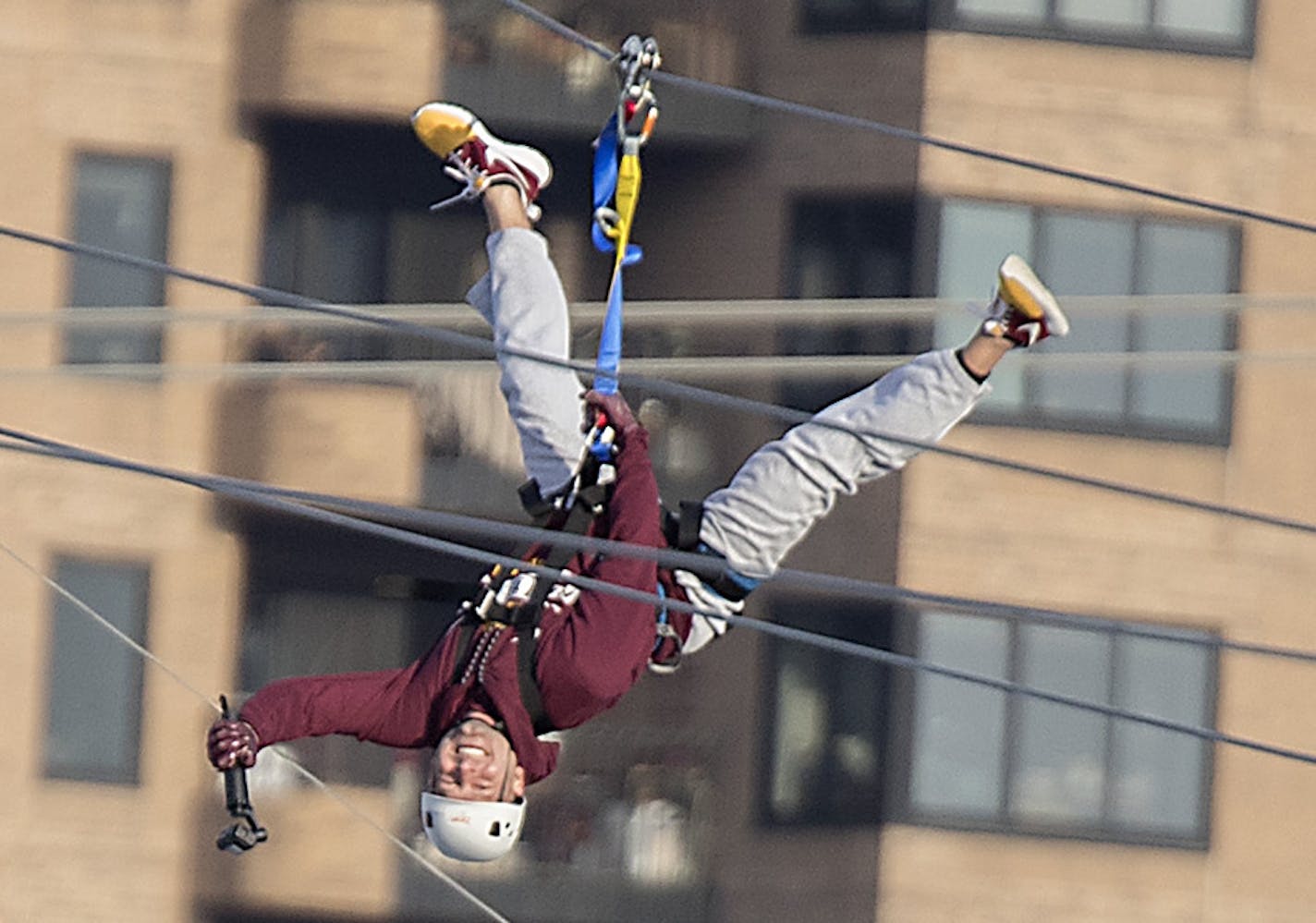 Minnesota Gophers coach P.J. Fleck made his way across the Mississippi River via zip line, Friday, January 26, 2018 in Minneapolis, MN. ] ELIZABETH FLORES &#xef; liz.flores@startribune.com