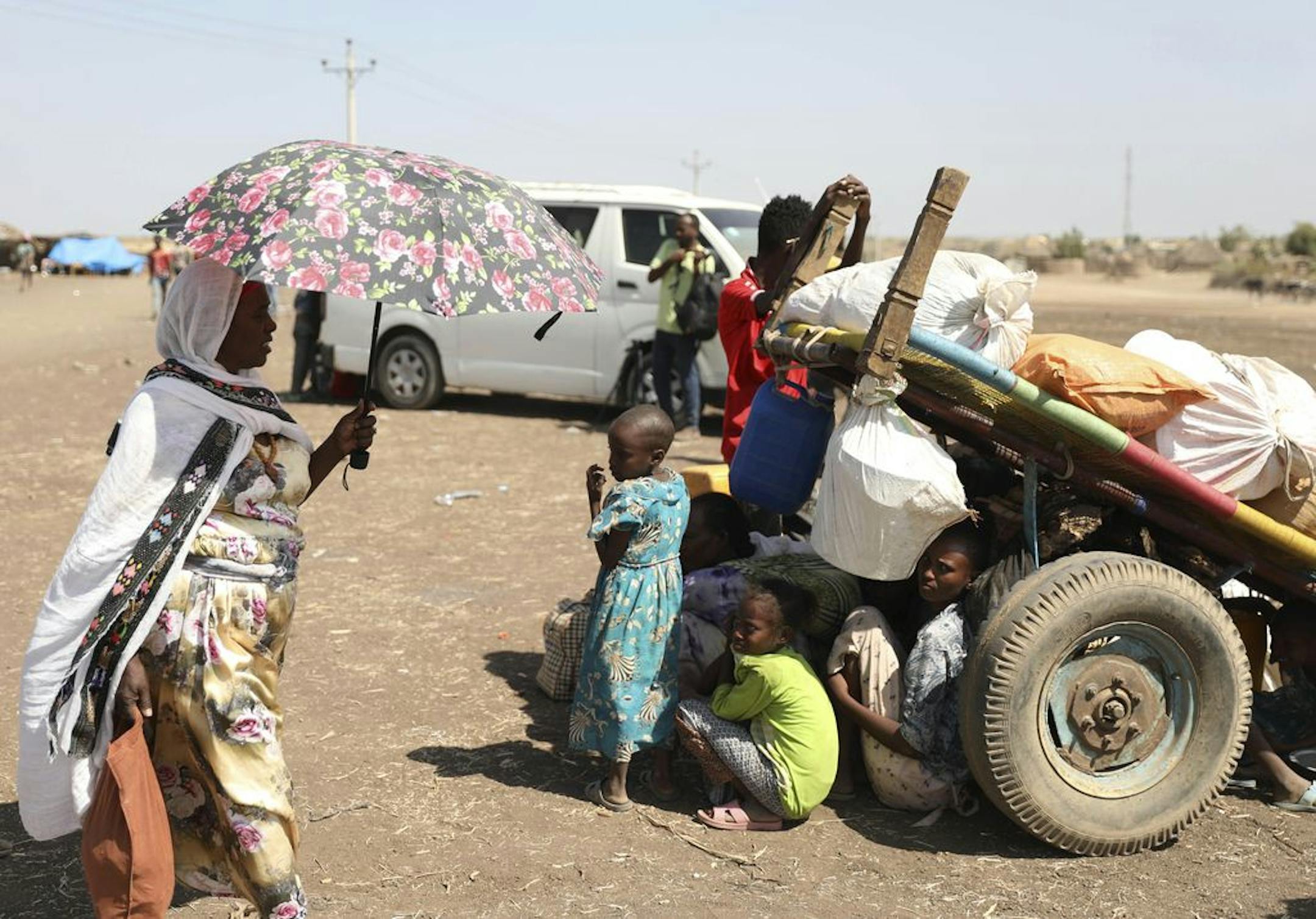 Refugees from the Tigray region of Ethiopia wait to register at the UNCHR center at Hamdayet, Sudan on Saturday, Nov. 14, 2020. Ethiopia's defiant Tigray regional government has fired rockets at two airports in the neighboring Amhara region as a deadly conflict threatens to spread into other parts of Africa's second-most populous country.