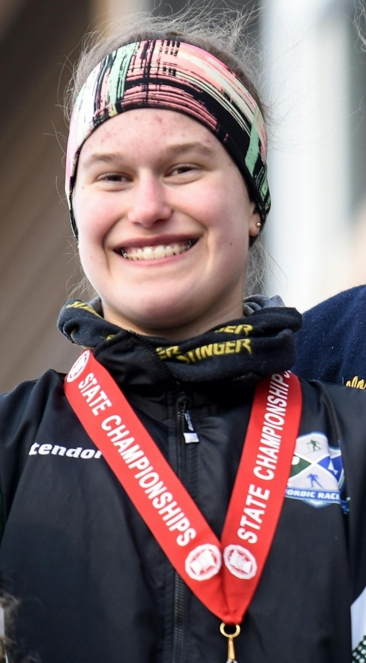 Wayzata's Mara McCollor, right, and Proctor's Hannah Bettendorf looked on for a photo after being awarded the first and second place medals respectively in the nordic skiing pursuit.