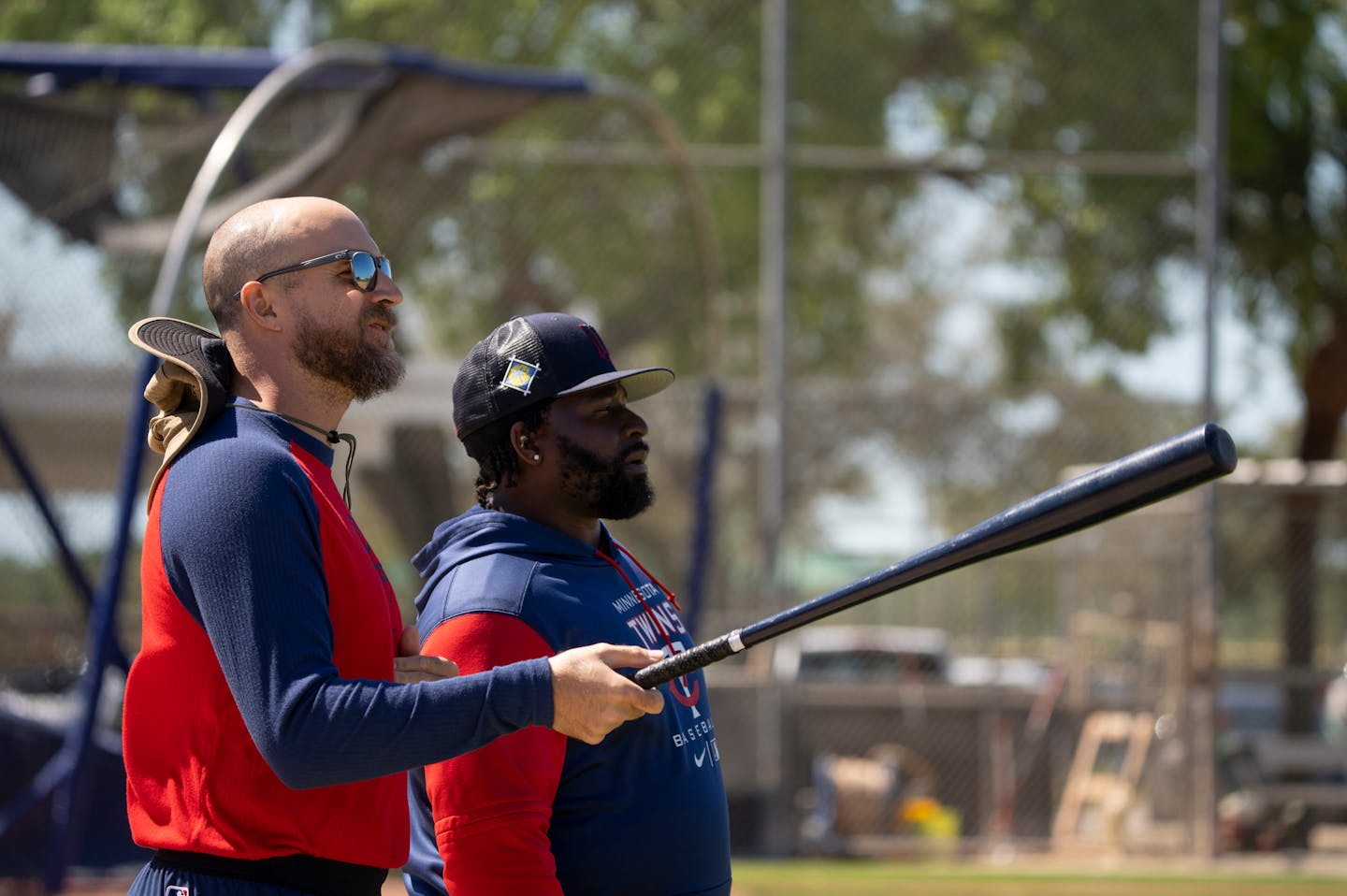 Twins manager Rocco Baldelli, left, and third base coach Tommy Watkins watched players as they stretched at Hammond Stadium in Fort Myers, Florida Sunday, March 13, 2022. With the lockout over, Minnesota Twins baseball players began reporting to Spring Training on Sunday.     ]   JEFF WHEELER • Jeff.Wheeler@startribune.com