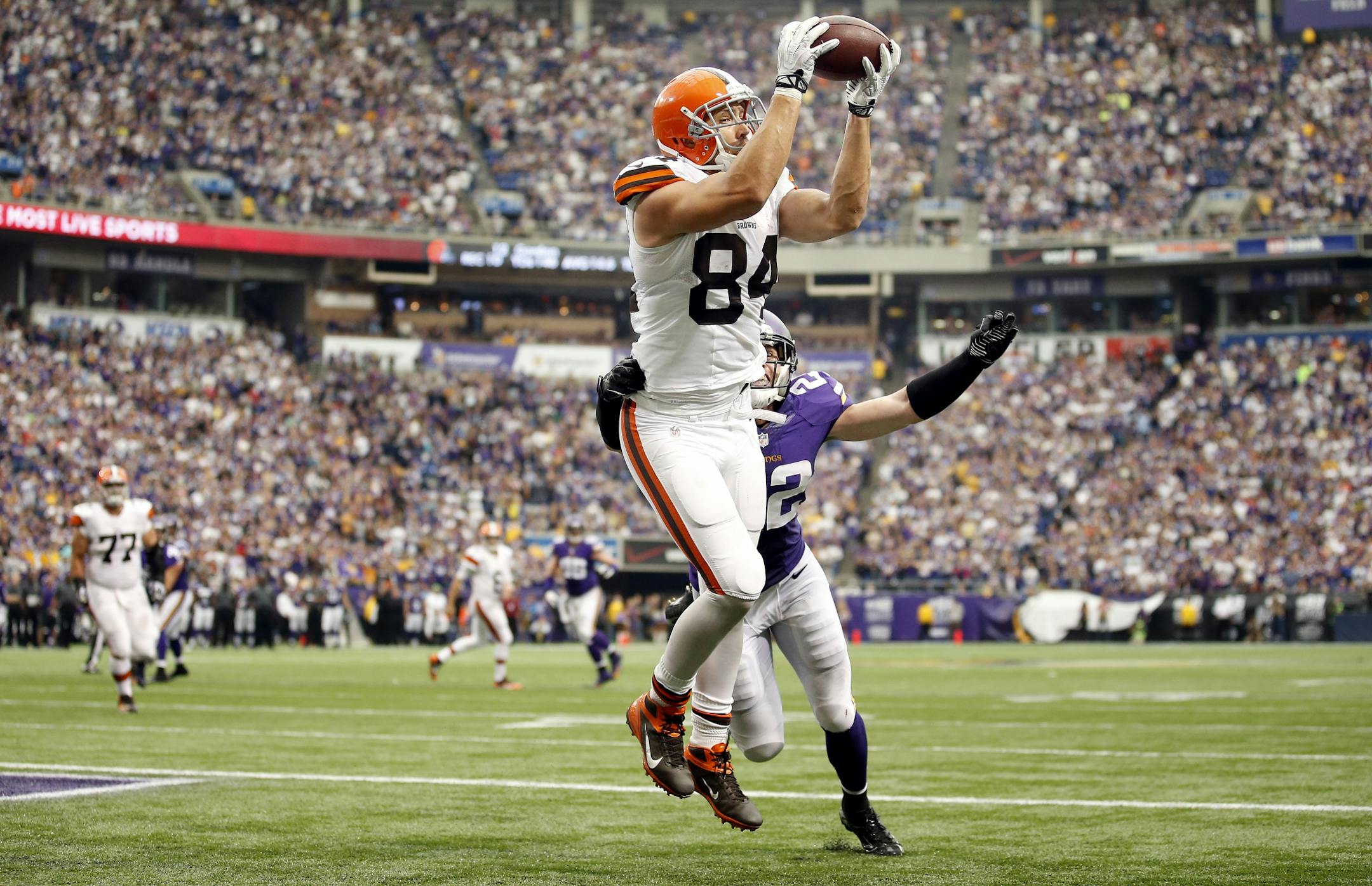 Jordan Cameron (84) of the Cleveland Browns caught a touchdown pass while being defended by Harrison Smith (22) late in the fourth quarter to give Cleveland the lead. Cleveland beat Minnesota by a final score of 31-27.