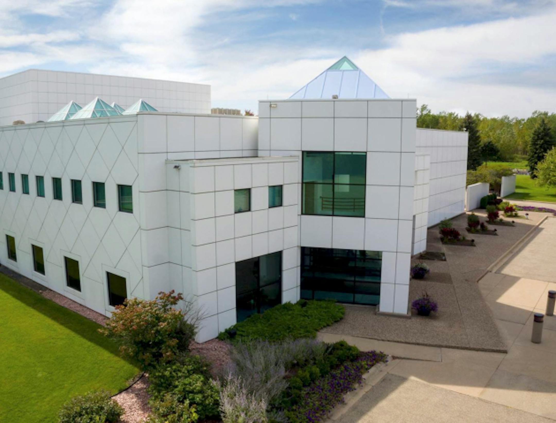 This undated photo provided by Paisley Park/NPG Records shows the exterior of Prince's Paisley Park in Chanhassen, Minn. Prince's handwritten notes are still sitting out inside the control room of Studio A where he recorded some of his greatest hits. It's filled with keyboards and guitars. Those are some of the highlights visitors will see when Prince's home and work space, Paisley Park, opens for its first public tours Thursday, Oct. 6, 2016. (Paisley Park/NPG Records via AP) ORG XMIT: MIN2016102420292865