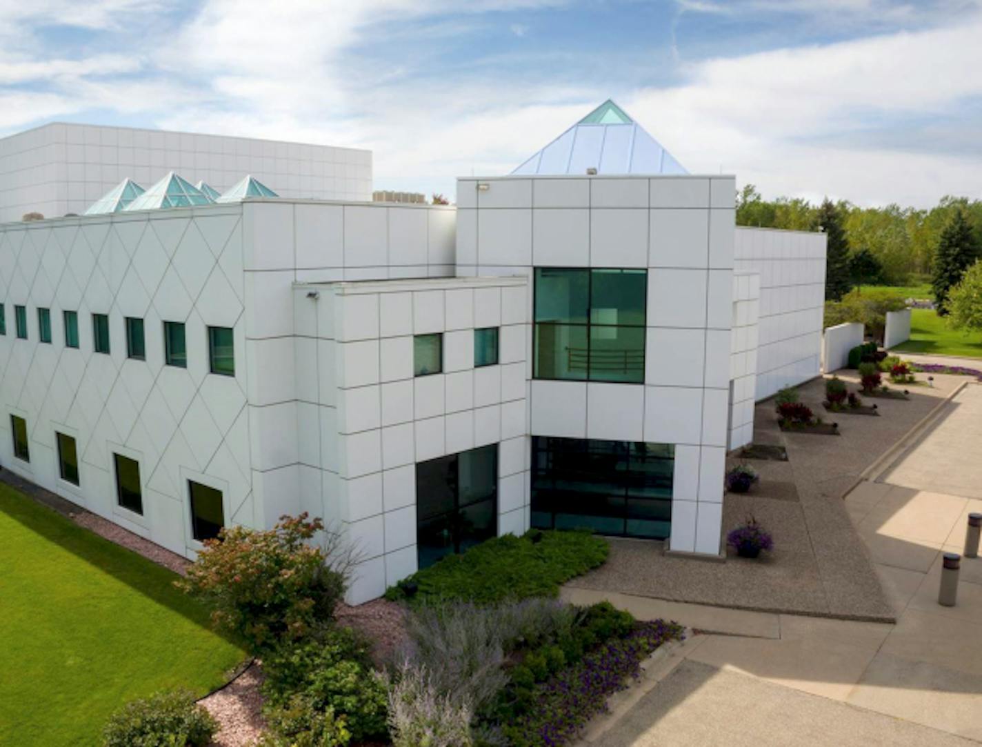 This undated photo provided by Paisley Park/NPG Records shows the exterior of Prince's Paisley Park in Chanhassen, Minn. Prince's handwritten notes are still sitting out inside the control room of Studio A where he recorded some of his greatest hits. It's filled with keyboards and guitars. Those are some of the highlights visitors will see when Prince's home and work space, Paisley Park, opens for its first public tours Thursday, Oct. 6, 2016. (Paisley Park/NPG Records via AP)   ORG XMIT: MIN2016102420292865