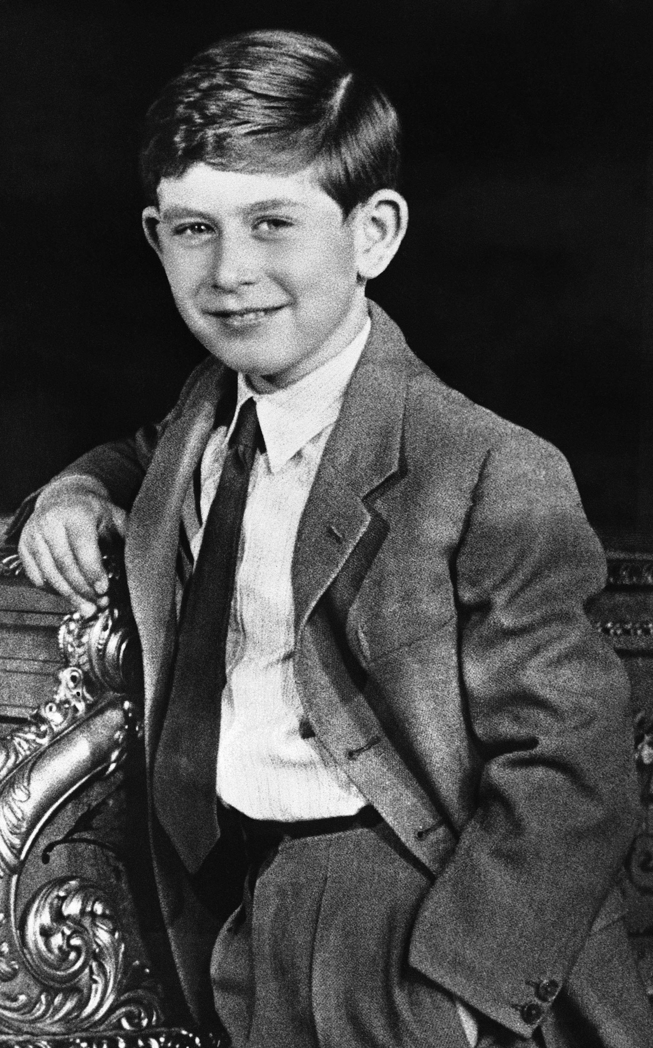 FILE - In this Nov. 13, 1947 file photo, Britain's Prince Charles poses at Buckingham Palace, in London. Prince Charles is readying the paperwork to claim his pension when he turns 65 on Thursday, Nov. 14, 2013, but he still hasn't started the job he was born to do. (AP Photo, File, Pool)