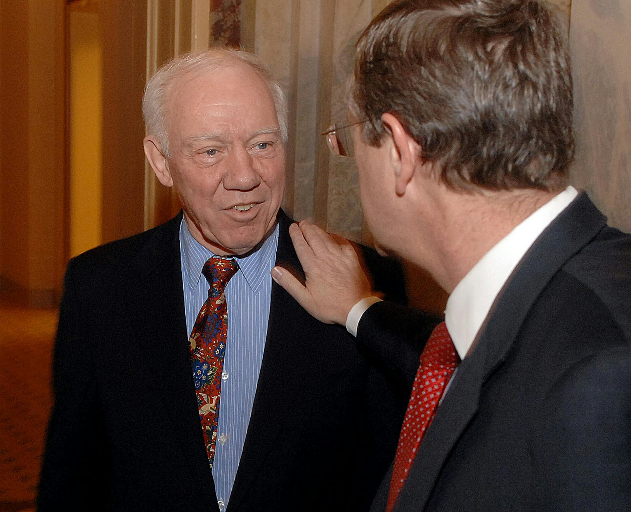 U.S. Rep. Jim Oberstar, left, chats with Sen. Kent Conrad (D-ND), as Oberstar walks to a meeting on the Senate side of the U.S. Capitol on Wednesday, January 10, 2007. (George Bridges/MCT)
