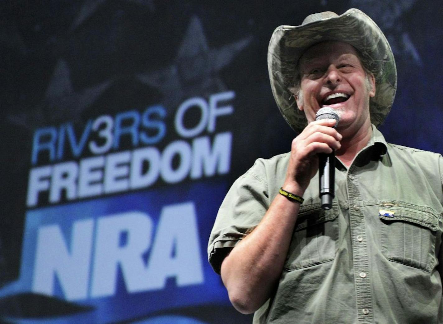 FILE - In this May 1, 2011 file photo, musician and gun rights activist Ted Nugent addresses a seminar at the National Rifle Association's convention in Pittsburgh. Nugent says he will meet with the Secret Service on Thursday to explain his raucous remarks about what he called Barack Obama�s �evil, America-hating administration� _ comments that some critics interpreted as a threat against the president.