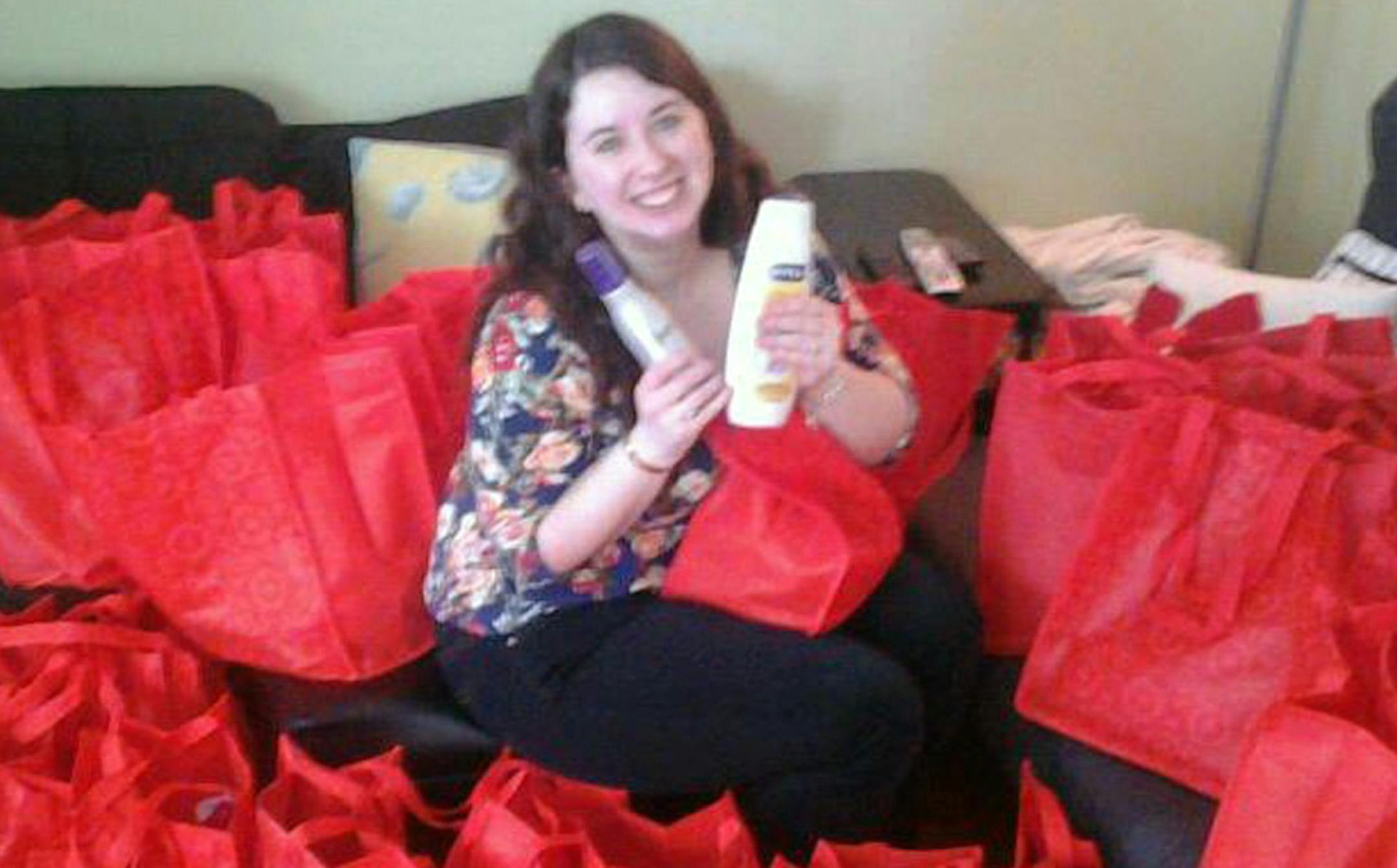 Lindsay Gorelick displayed the many bags of products she bought with coupons for shelter residents.