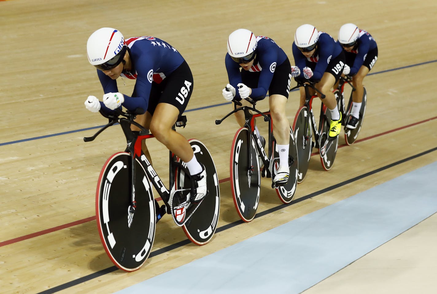 United States' team competes in the women's team pursuit first round cycling event at the Rio Olympic Velodrome during the 2016 Summer Olympics in Rio de Janeiro, Brazil, Saturday, Aug. 13, 2016. (AP Photo/Patrick Semansky) ORG XMIT: OCYC146