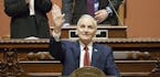 Minnesota Governor Mark Dayton waves and smiles at his family in the House Gallery in St. Paul, Minn., Wednesday, March 14, 2018, during his final Sta