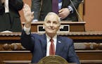 Minnesota Governor Mark Dayton waves and smiles at his family in the House Gallery in St. Paul, Minn., Wednesday, March 14, 2018, during his final Sta