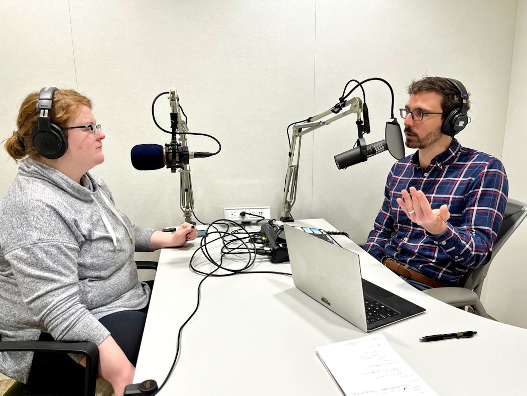 Ash Miller and Eric Roper record an episode of the Curious Minnesota podcast in early December.