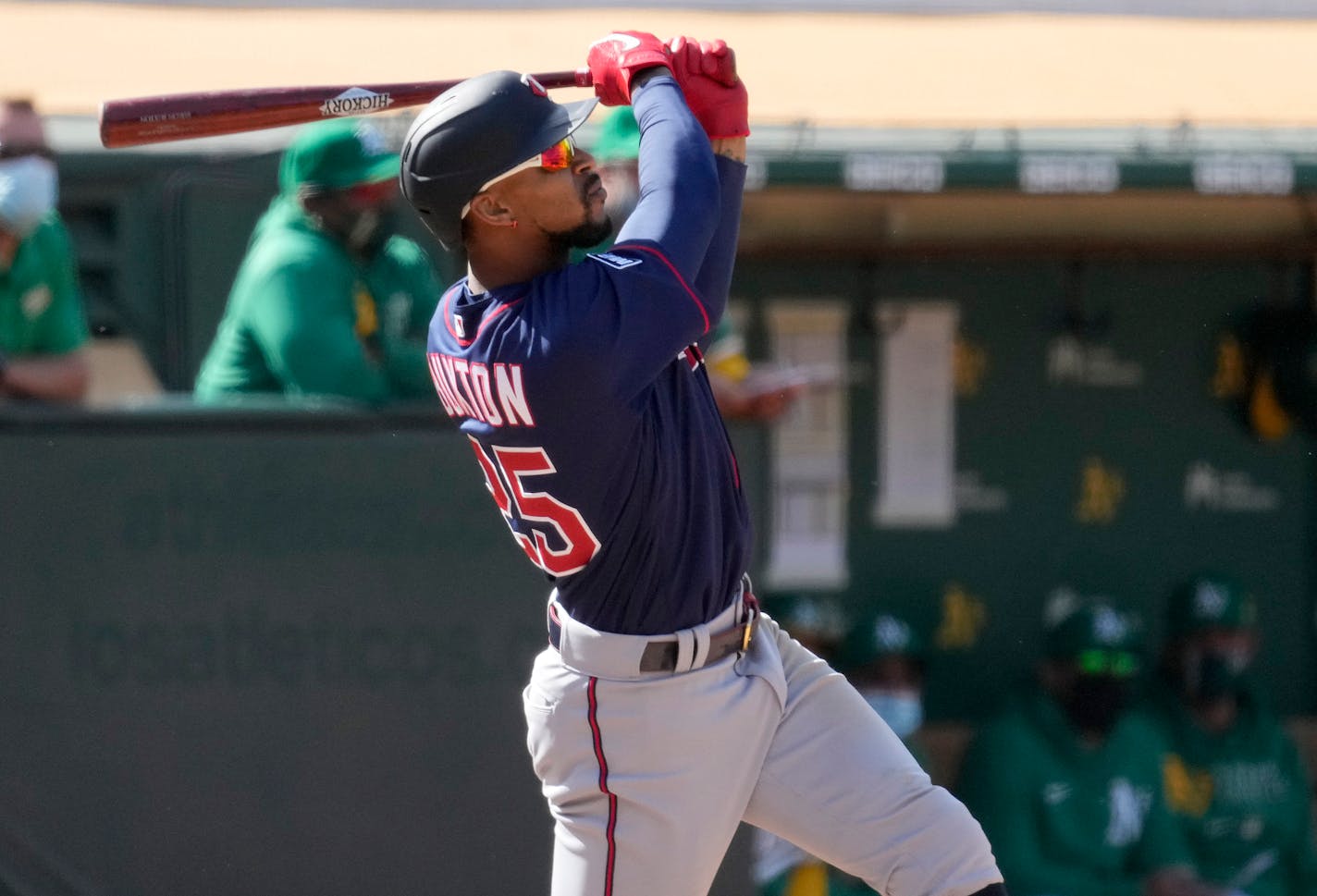 Minnesota Twins' Byron Buxton (25) hits a two run home run against the Oakland Athletics during the tenth inning of a baseball game on Wednesday, April 21, 2021, in Oakland, Calif. (AP Photo/Tony Avelar)