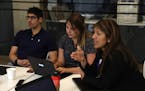 Ana Milena Salamanca, right, and others in Nielsen company's data science team meet at the company's offices in Chicago on Wednesday, June 27, 2018. (