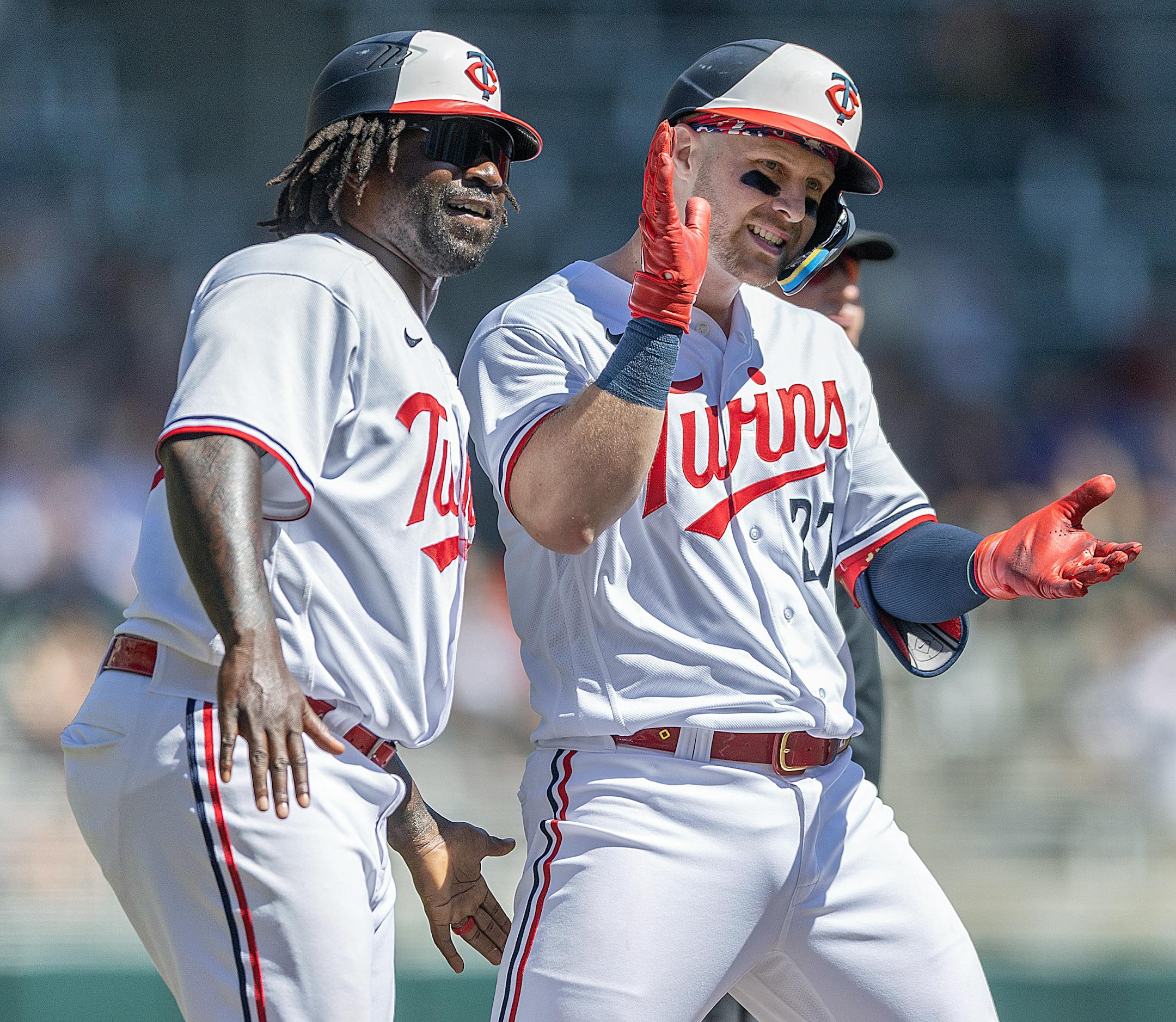 Minnesota Twins catcher Ryan Jeffers (27) celebrates a triple during the bottom of the fourth inning.