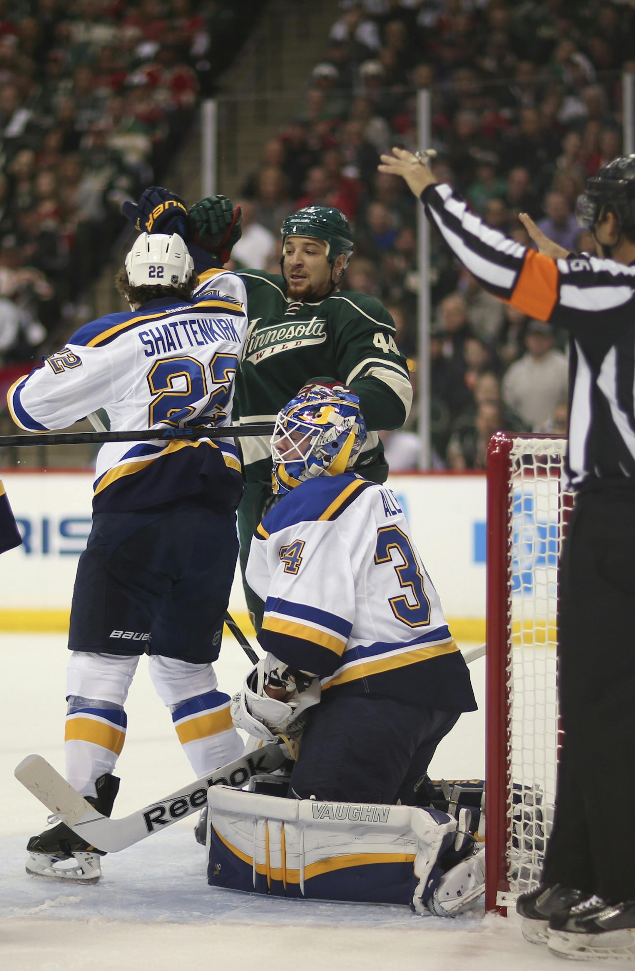 St. Louis Blues defenseman Kevin Shattenkirk (22) and Minnesota Wild right wing Chris Stewart (44) tussled in the crease after a first period whistle Monday night. ] JEFF WHEELER ï jeff.wheeler@startribune.com The Minnesota Wild and the St. Louis Blues met in game 3 of their NHL playoff series Monday night, April 20, 2015 at Xcel Energy Center in St. Paul.