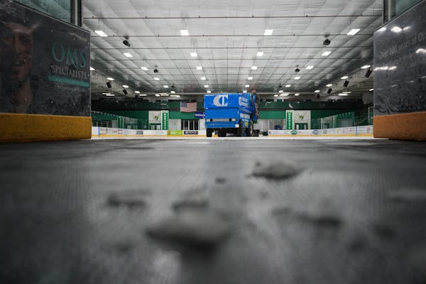 Arena maintenance coordinator Hunter Sieve drove a Zamboni to clean a sheet of ice at Braemar Arena in Edina on Jan. 31.
