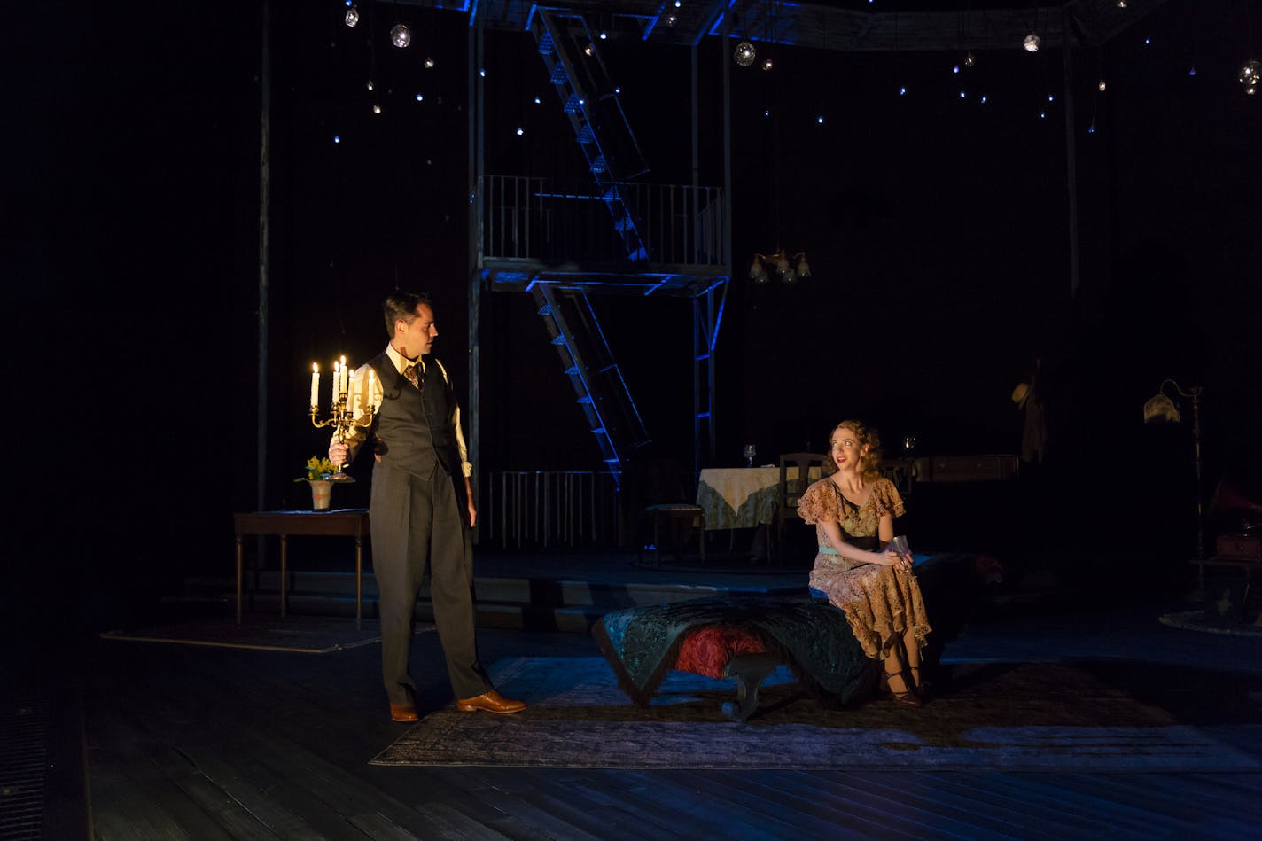 Grayson DeJesus as Jim O'Connor and Carey Cox as Laura Wingfield in "The Glass Menagerie" at the Guthrie Theater.