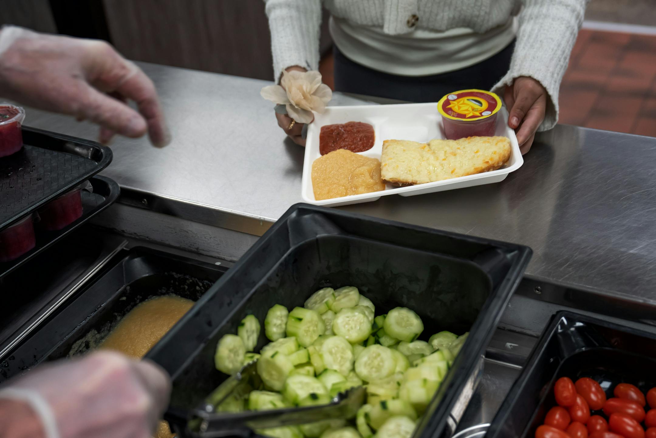 Fifth graders ate school lunch at Champlin-Brooklyn Park Academy on Friday, Feb. 17, 2023 in Champlin, Minn.