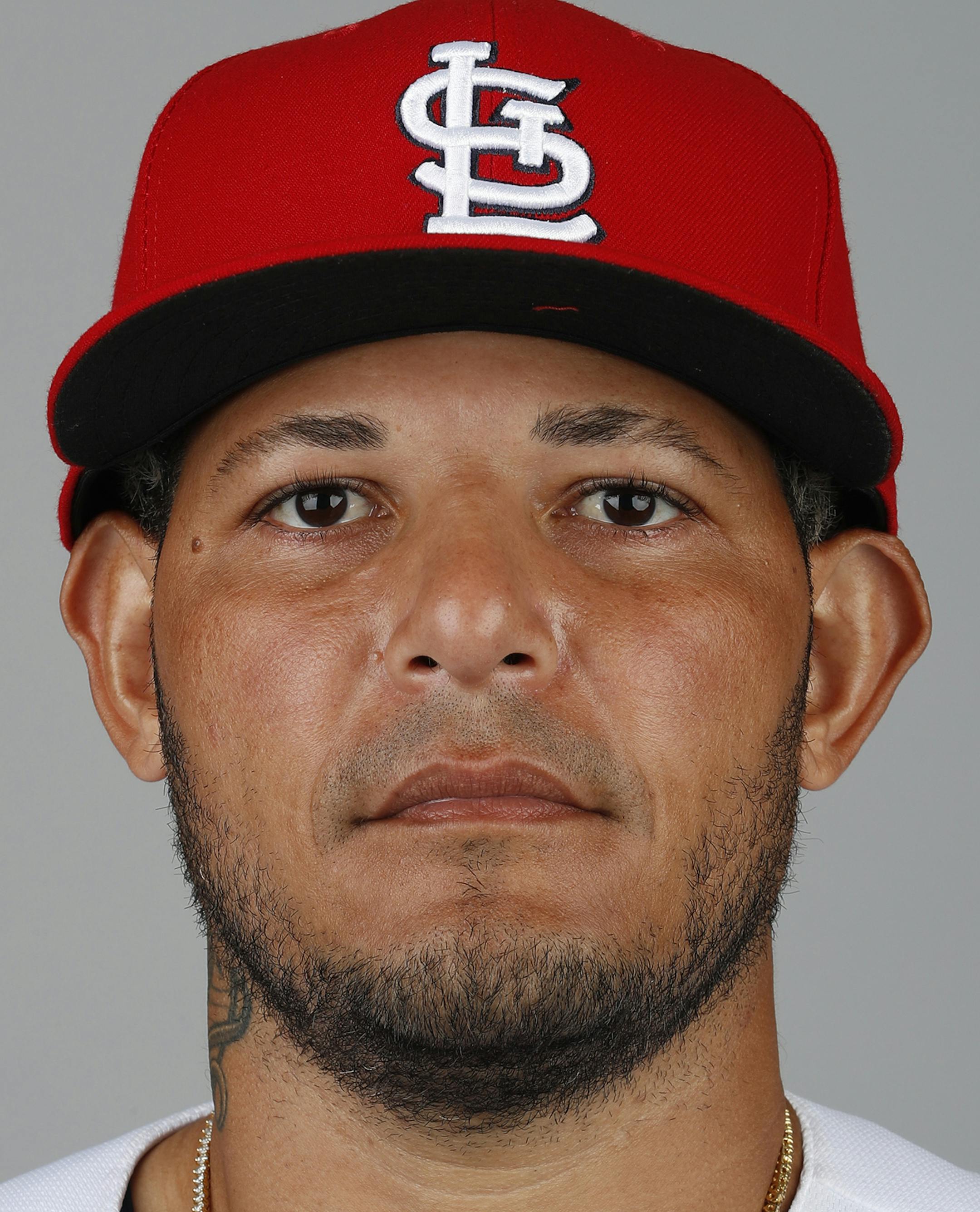 This is a 2018 photo of Yadier Molina of the St. Louis Cardinals baseball team. This image reflects the Cardinals active roster as of Feb. 20, 2018 when this image was taken. (AP Photo/Jeff Roberson) ORG XMIT: FLJR