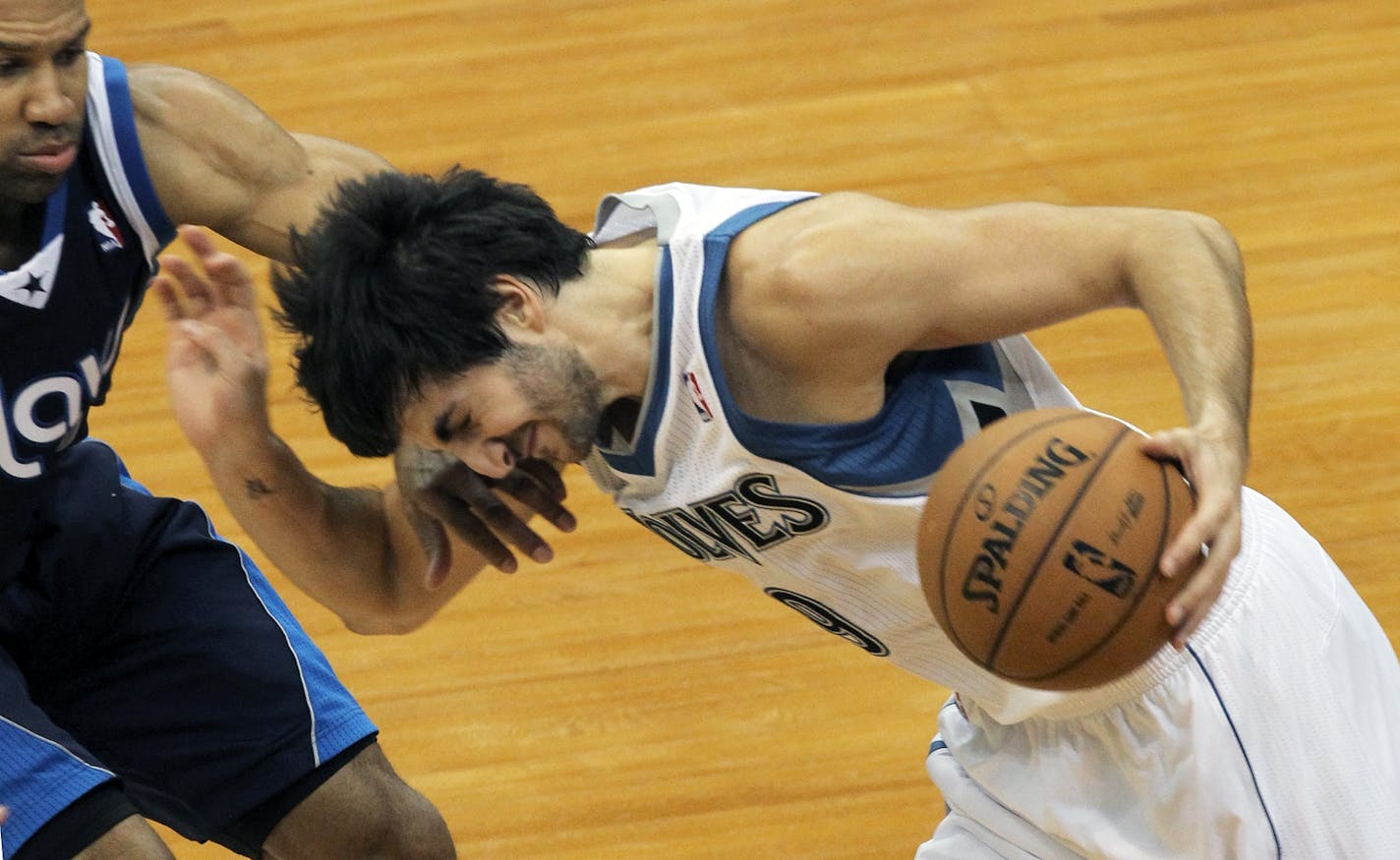 Timberwolves vs. Dallas. Wolves Ricky Rubio returned to the lineup after a lengthy absence from the court due to a knee injury. Rubio attempted to drive around Dallas guard Derek Fisher in 2nd half action. (MARLIN LEVISON/STARTRIBUNE(mlevison@startribune.com