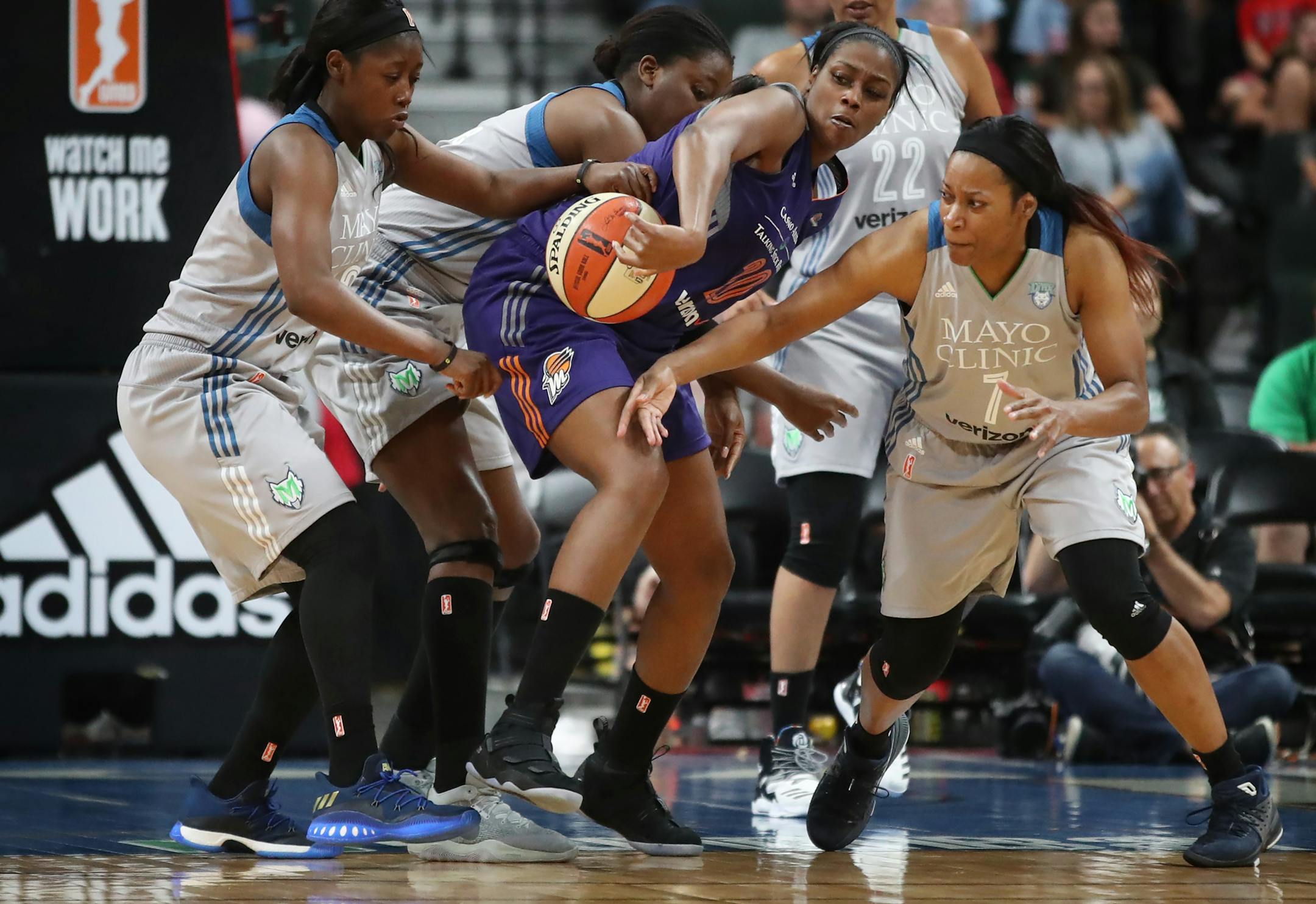 Phoenix Mercury forward Camille Little (20) was stopped by Minnesota Lynx guard Alexis Jones (12) left and Minnesota Lynx guard Jia Perkins (7) at Xcel Energy Center on Tuesday August 22,2017 in St. Paul,MN.