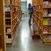A shopper at the flagship PowellÕs Books store in Portland, Oregon, on Nov. 2, 2021. Like the rest of PortlandÕs urban core Ñ and like downtowns ac