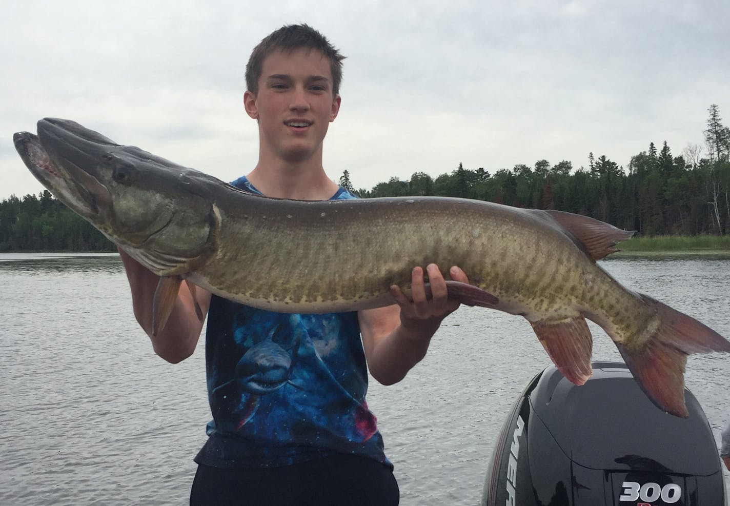 Max Bortnem, 15, of Minnetrista, caught a 47-inch muskie -- his first muskie -- on Lake of the Woods in a single cast with a white and silver spinnerbait. ORG XMIT: MIN1607260021370728