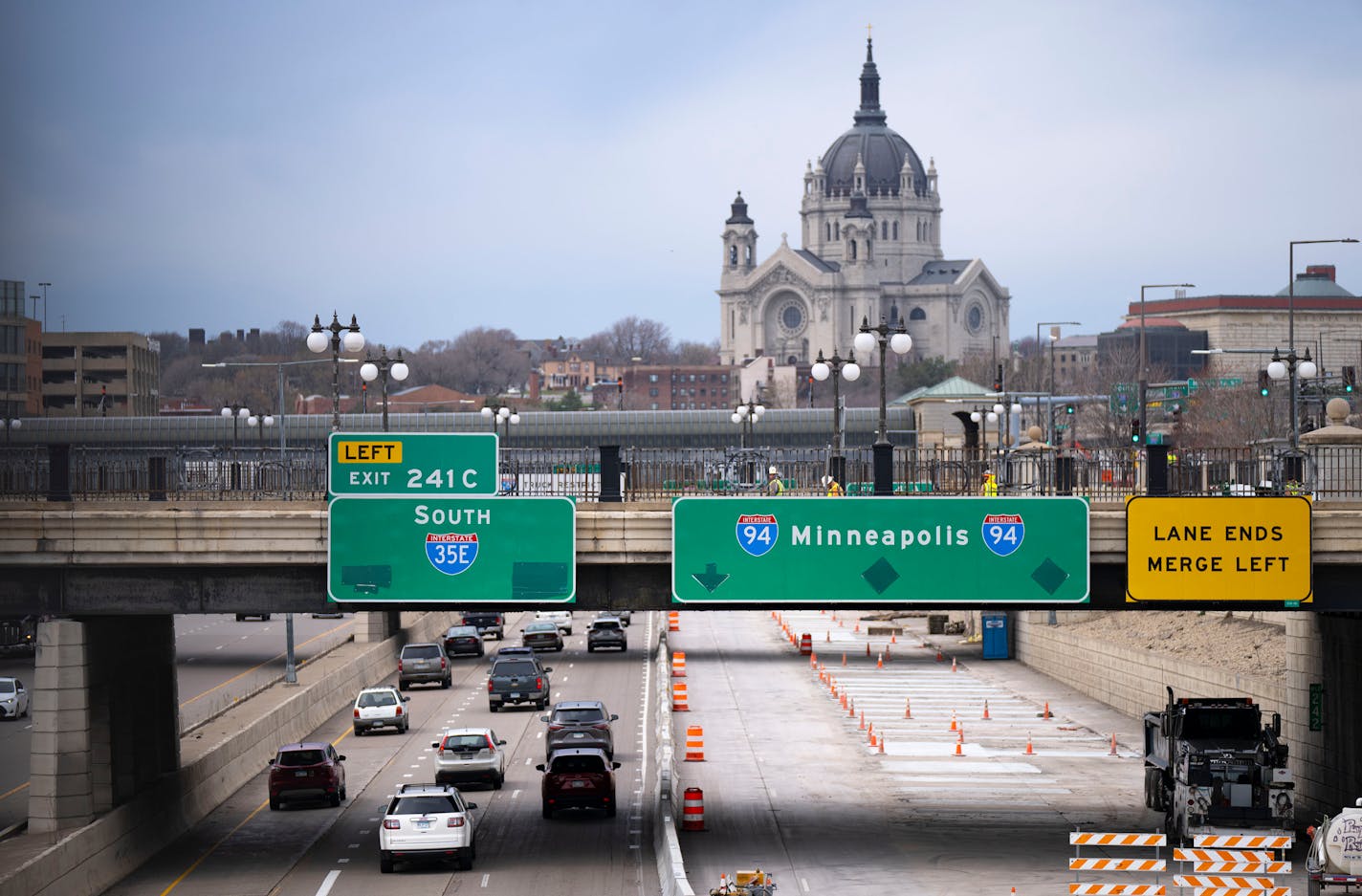 Construction on Interstate 94 has traffic limited to two lanes Thursday, May 5, 2022 in St. Paul, Minn. ]