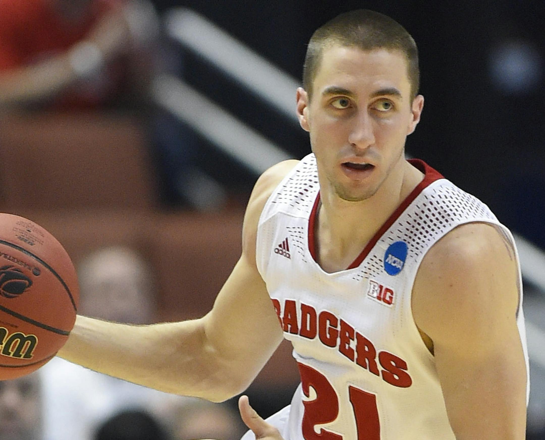 Wisconsin guard Josh Gasser (21) pushes up court against Baylor during the second half in a regional semifinal NCAA college basketball tournament game, Thursday, March 27, 2014, in Anaheim, Calif. (AP Photo/Mark J. Terrill) ORG XMIT: NYOTK