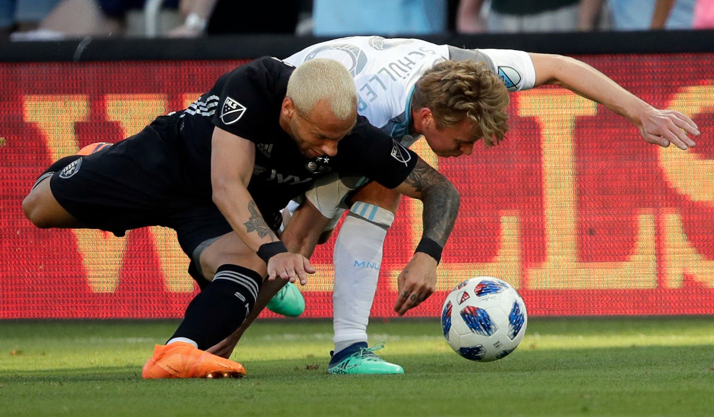 Sporting Kansas City midfielder Yohan Croizet, left, and Minnesota United midfielder Rasmus Schuller struggled for the ball during the first half of an MLS soccer match in Kansas City, Kan., on Sunday. Sporting Kansas City won 4-1.