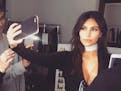 Social media star Kim Kardashian West is the queen of the unsmiling selfie.