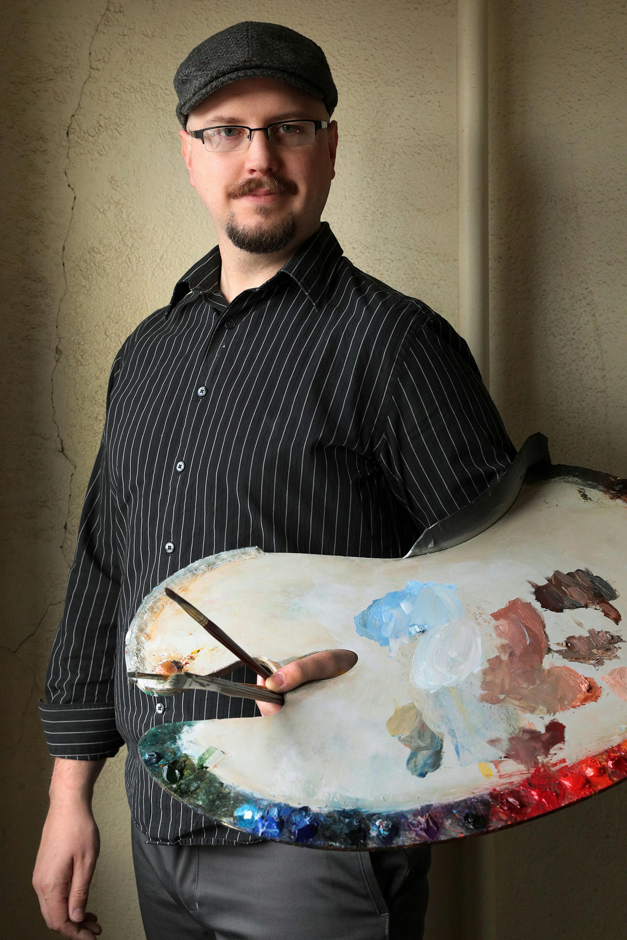 Artist Mat Ollig stood for a portrait at his studio Wednesday morning. ] ANTHONY SOUFFLE • anthony.souffle@startribune.com Artist Mat Ollig is working on his project painting a handful of the most classic diners from around the state Wednesday, Dec. 7, 2016 at his Studio in Minneapolis. Now finishing up, he's launching a scavenger hunt of sorts to introduce his art and the beloved old-style food joints to the public