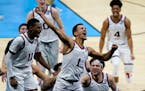 Gonzaga guard Jalen Suggs (1) celebrates making the game winning basket against UCLA during overtime in a men's Final Four NCAA college basketball tou