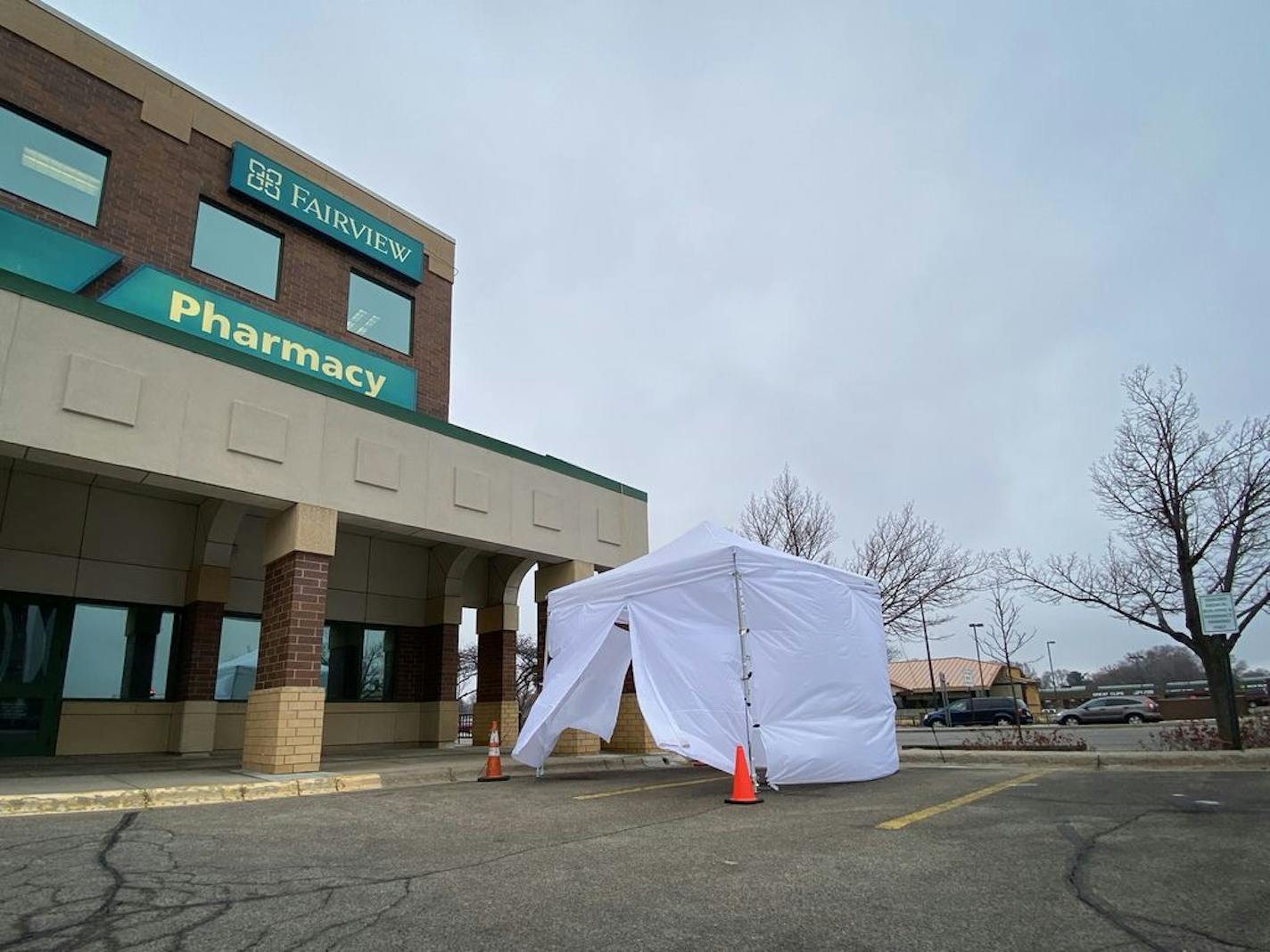 M Health Fairview has suspended its drive-through COVID-19 collection activities, as Minnesota's public health lab has restricted testing following a surge of activity that taxed its supply of kits and chemical reagents needed to confirm the presence of the corona­virus that causes the illness. This M Health Fairview clinic in Bloomington had previously utilized a tent in the parking lot.