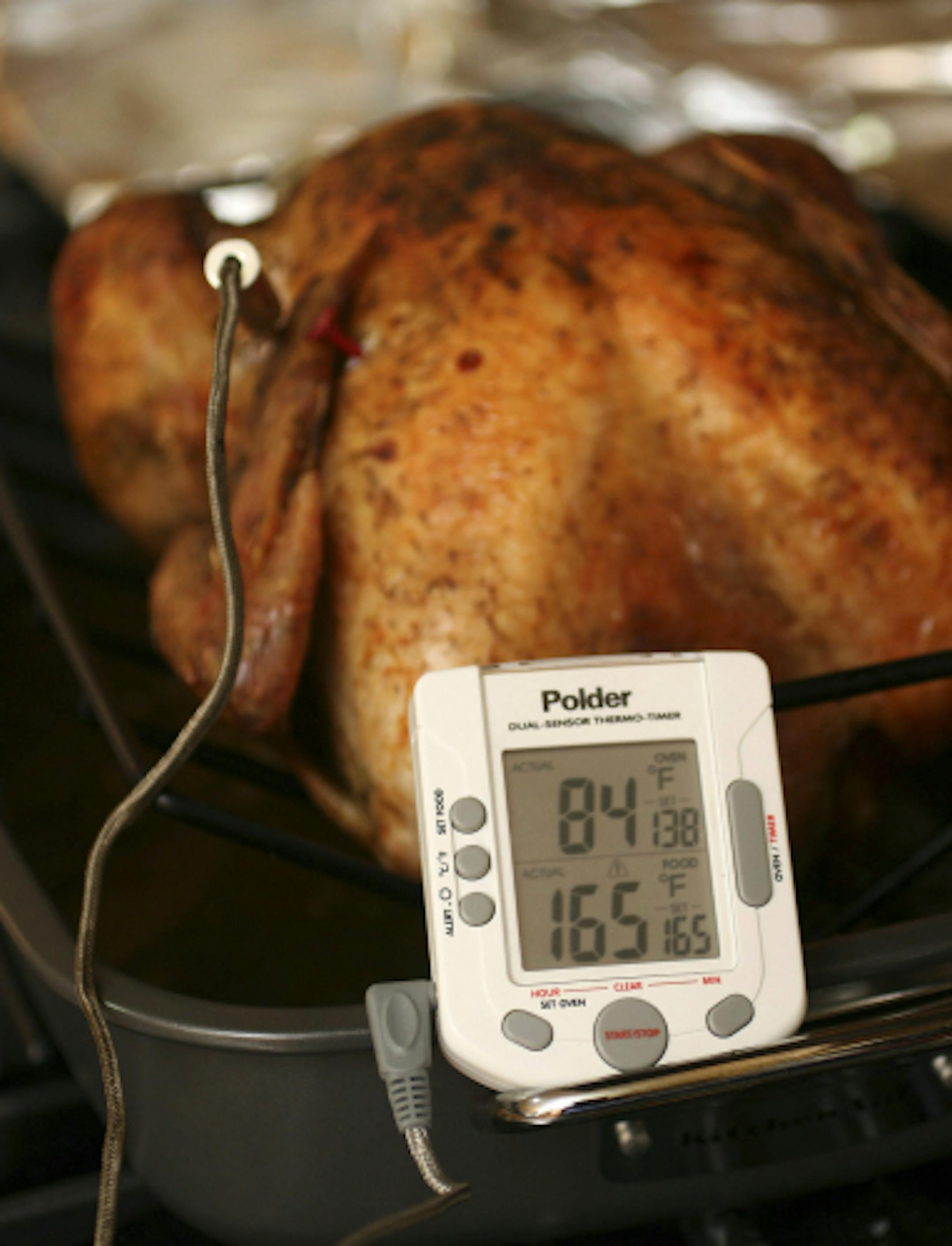 Federal guidelines state that your turkey is safe to eat when the innermost part of the thigh reaches 165 F. If the turkey is stuffed the stuffing must also reach 165F.
