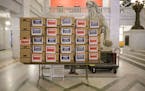 Boxes containing more than 20,000 signed petitions in support of replacing the Minneapolis Police Department were delivered to City Hall in April.