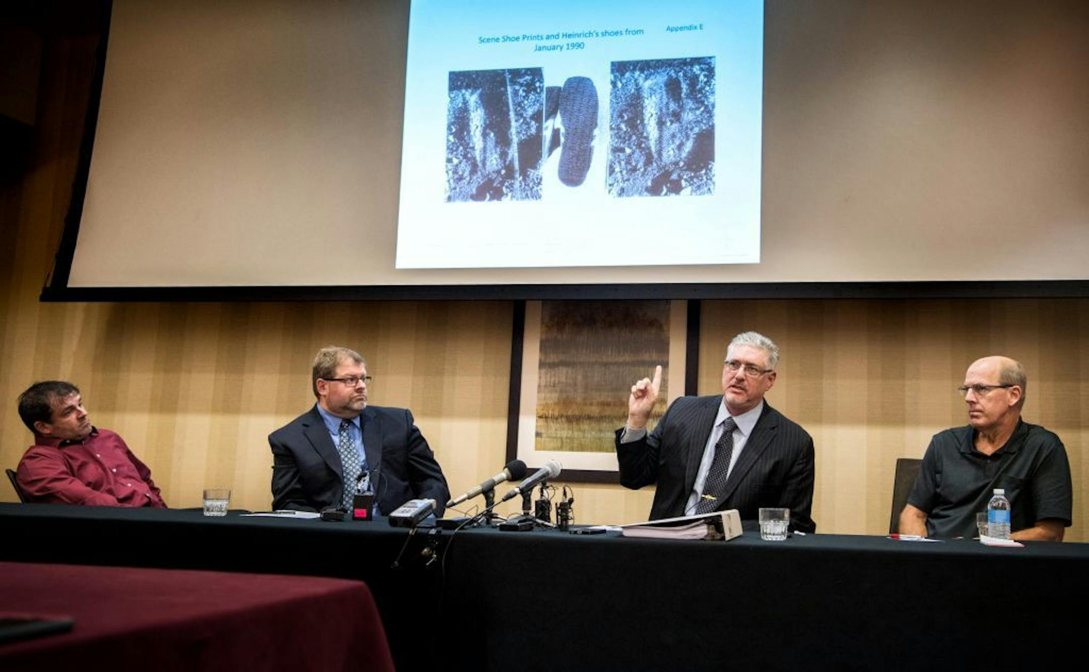 Ryan Larson and his attorney Devon Jacob were at a press conference along with Dan Rassier, right and his attorney Michael Padden at the Marriott Northwest Hotel in Brooklyn Park.