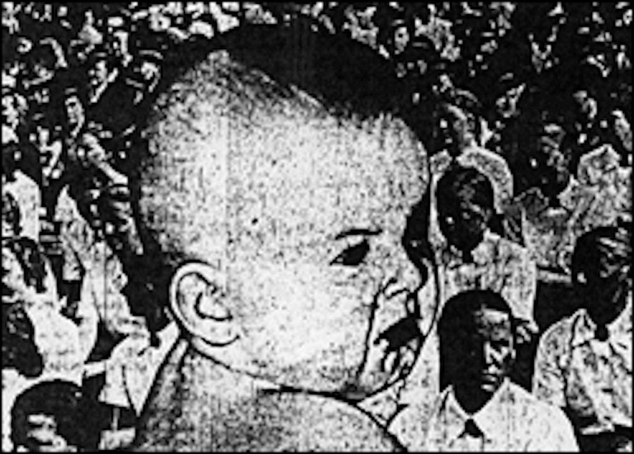 March 1940: Star-Journal photo illustration of baby with German women in background.