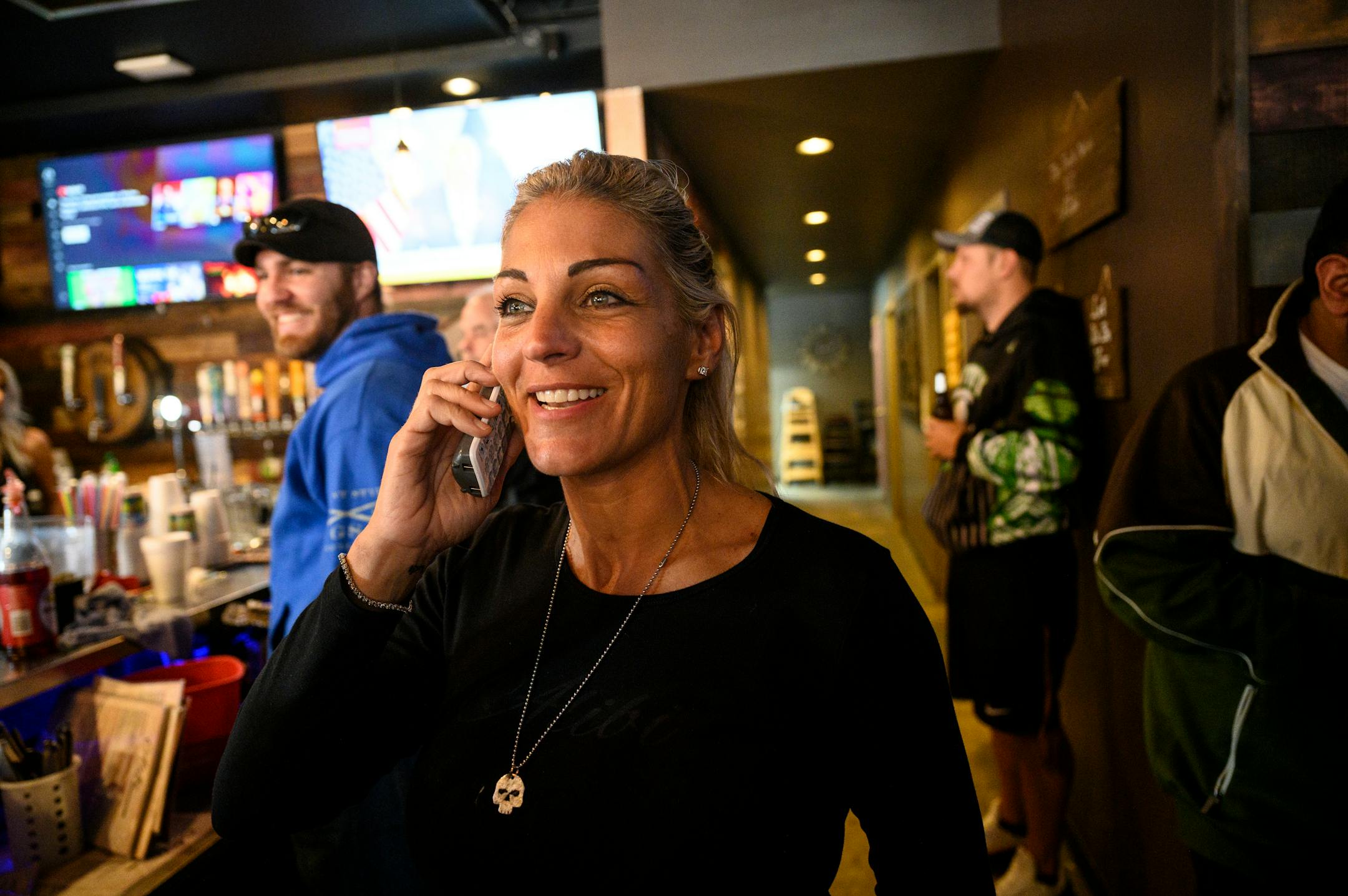 Lisa Monet Zarza, owner of Alibi Drinkery in Lakeville, talked to a caller Wednesday afternoon asking if she takes reservations.