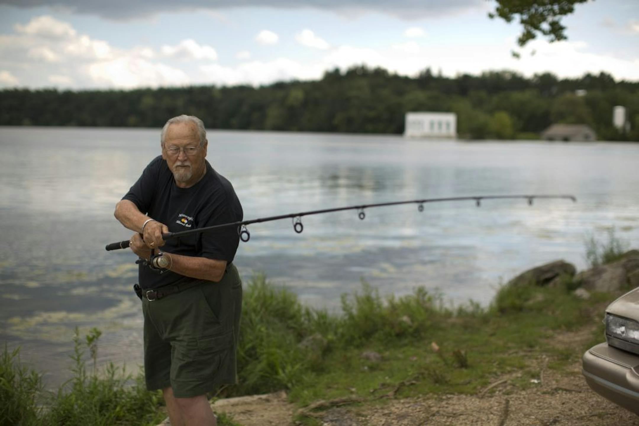 Roseville's Mike Pratt, a regular at Vadnais Lake during summer, prepared to cast from a small lot on the lake's west side. "I get here, I open my trunk, I get out my fishing gear, and I fish," he said.
