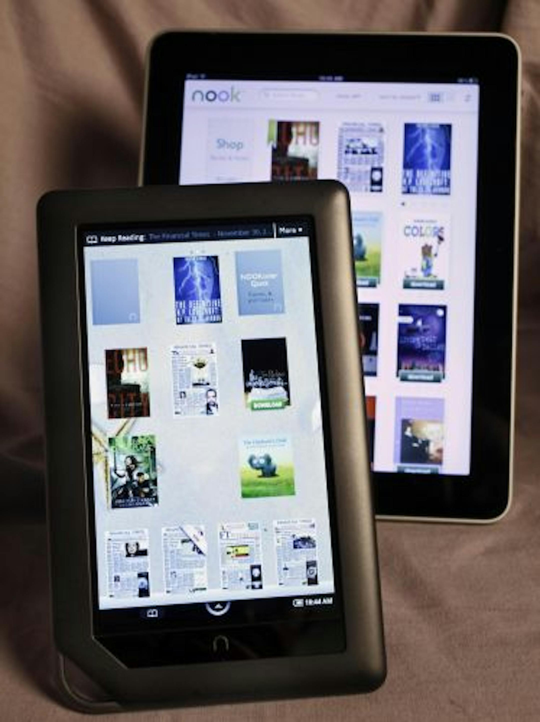 The Barnes & Noble NookColor, left, and an Apple iPad.