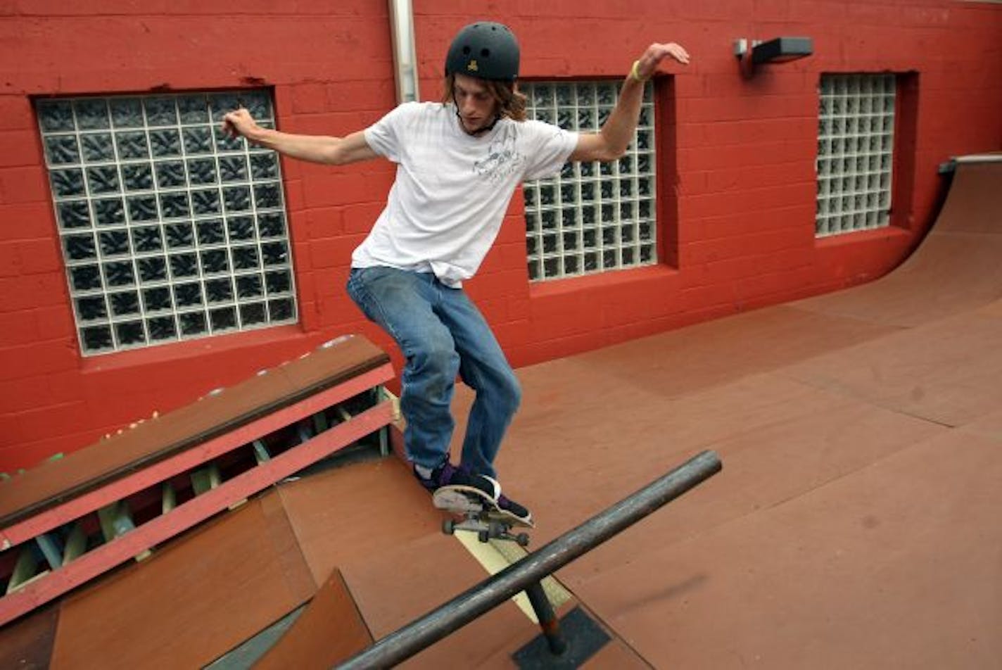 Jonny Nelson and his group take turns at the outside ramps.