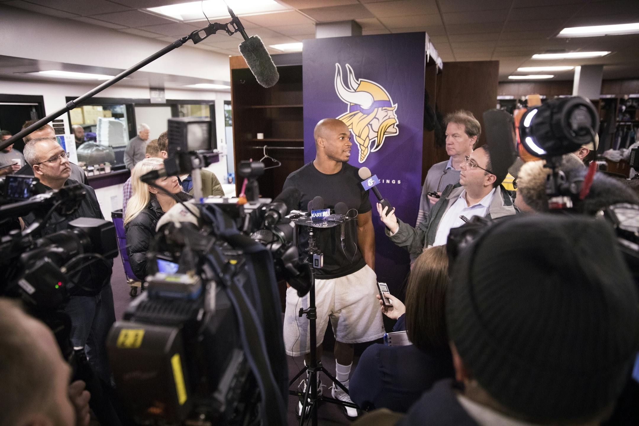Adrian Peterson speaks to the media.