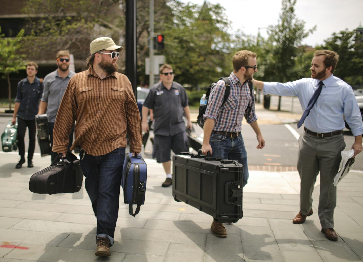 While the band carried their instruments as they arrived at National Public Radio's Washington, DC headquarters to tape a Tiny Desk Concert, Dave Simonett was greeted by Jamie DeAtley, a fan who had staked out the NPR offices to hopefully meet the band and get an album autographed. ] JEFF WHEELER &#x2022; jeff.wheeler@startribune.com Trampled By Turtles recorded a Tiny Desk Concert at National Public Radio's offices in Washington, DC Wednesday afternoon, July 16, 2014.