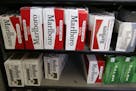 FILE - In this April 17, 2014 file photo, Philip Morris' Marlboro cigarettes are on display at a market in Palo Alto, Calif. Philip Morris Internation